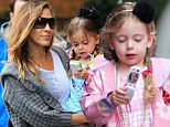 They must have a great family plan! Sarah Jessica Parker and Matthew Broderick give the twins toy cell phones en route to school
