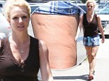 The dimpled truth: Britney Spears displays her cellulite in a pair of unflattering shorts 