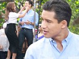 School reunion! Leah Remini pinches old Saved By The Bell co-star Mario Lopez' cheeks on set of Extra