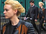 Peas in a pod! Carey Mulligan and Marcus Mumford hold hands as they go for stroll in New York