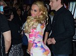 Hawt stuff: Coco looked incredibly in her colourful bodycon 